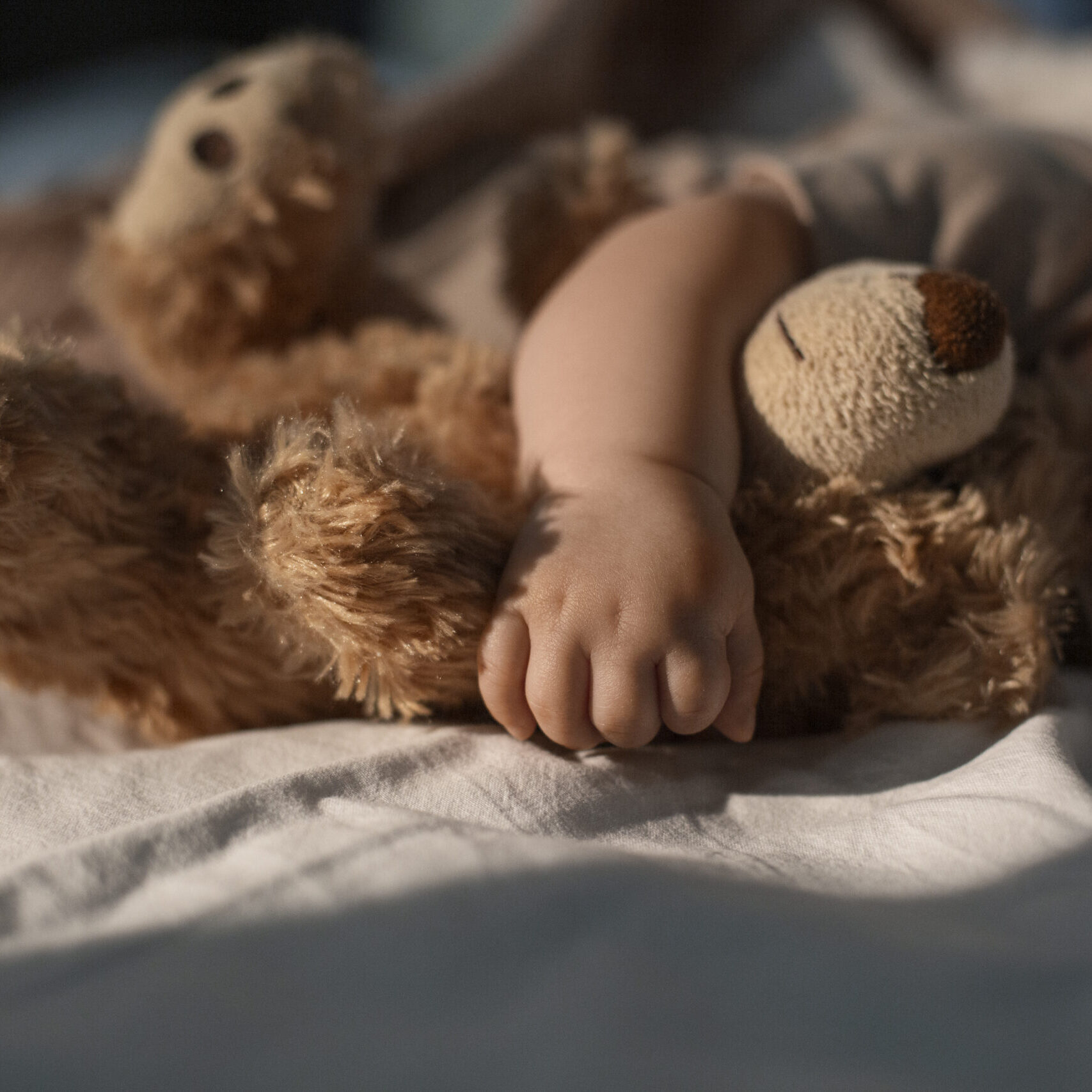 baby-with-stuffed-animal (1)